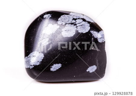Macro mineral stone snow obsidian on white background 129928878