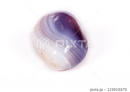 Macro mineral stone Agate Botswana gray on white background 129928879