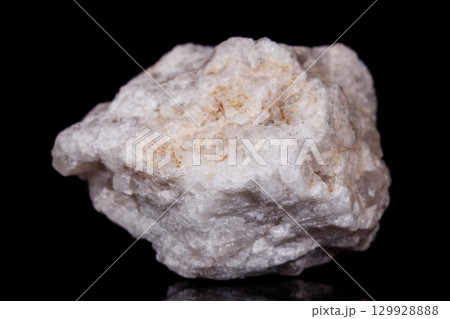 Macro mineral stone Albit on black background 129928888