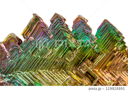 Macro of the mineral bismuth stone on a white background 129928891
