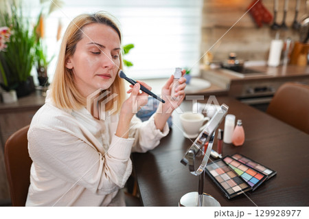 Creating a flawless look in a cozy kitchen with natural light 129928977