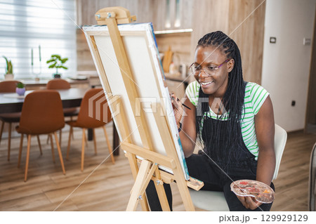 Creating art in a modern kitchen on a sunny afternoon Creating art in a modern kitchen on a sunny afternoon 129929129