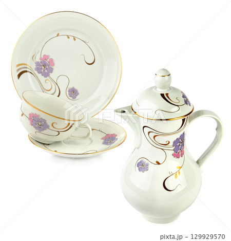 Vintage Teacup and Coffee Pot isolated on white background. Elegant Porcelain Coffee Set. 129929570