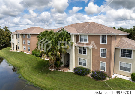 Low-rise apartment condos in peaceful Florida suburb, example of planned residential development in the United States 129929701