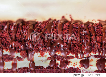 Festive layered chocolate cake with milk cream, dark chocolate cake 129929936