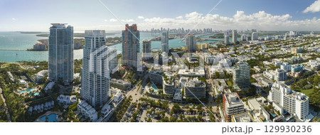 Miami Beach city American southern architecture. South Beach high luxurious hotels and apartment buildings. Tourist infrastructure in southern Florida, USA 129930236