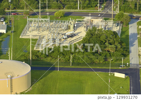 Aerial view of modern water cleaning facility at urban wastewater treatment plant. Purification process of removing undesirable chemicals, suspended solids and gases from contaminated liquid Aerial view of modern water cleaning facility at urban wastewater treatment plant. Purification process of removing undesirable chemicals, suspended solids and gases from contaminated liquid 129931270