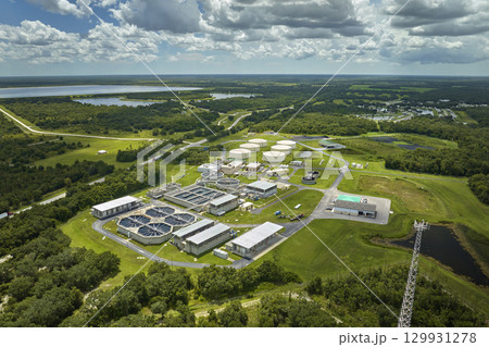 Aerial view of modern water cleaning facility at urban wastewater treatment plant. Purification process of removing undesirable chemicals, suspended solids and gases from contaminated liquid 129931278