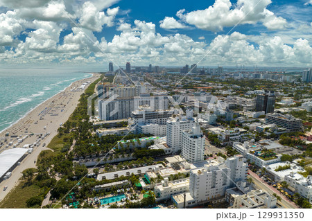 Miami Beach city with high luxury hotels and condos and sandy beachfront 129931350