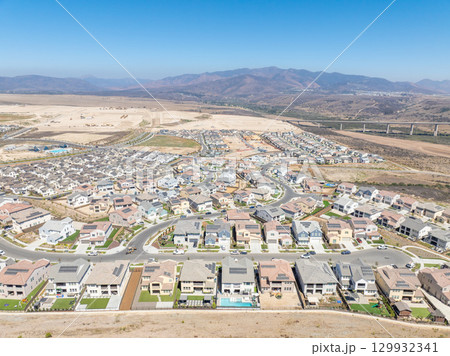 New development real estate. Aerial view of residential houses and driveways neighborhood in south San Diego, Chula Vista New development real estate. Aerial view of residential houses and driveways neighborhood in south San Diego, Chula Vista 129932341
