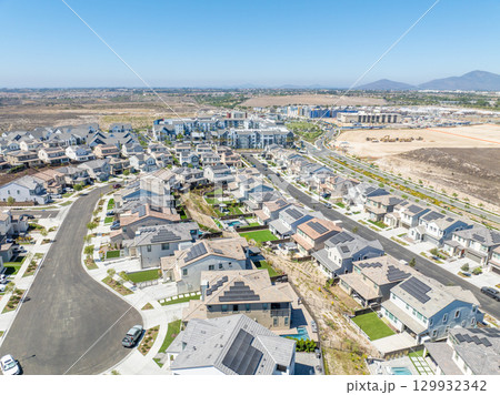 New development real estate. Aerial view of residential houses and driveways neighborhood in south San Diego, Chula Vista New development real estate. Aerial view of residential houses and driveways neighborhood in south San Diego, Chula Vista 129932342