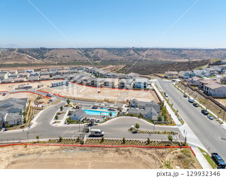 New development real estate. Aerial view of residential houses and driveways neighborhood in south San Diego, Chula Vista 129932346