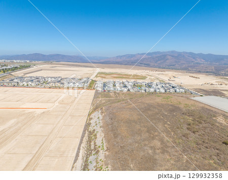 New development real estate. Aerial view of residential houses and driveways neighborhood in south San Diego, Chula Vista 129932358