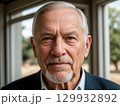 Close-Up Portrait of an Older Man in a Suit 129932892