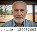 Portrait of a Smiling Senior Man in Natural Light 129932893