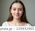 Portrait of a Young Woman with a Warm Smile 129932905