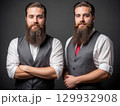 Identical Twins in Stylish Vests 129932908