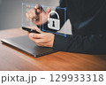 Adult man using a smartphone with a security keypad and padlock icon, symbolizing data protection, privacy, digital security, and secure mobile authentication for modern cybersecurity systems. 129933318