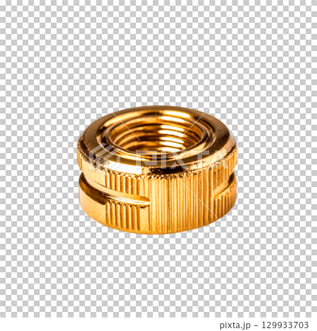 Close-Up Shot of a Gold-Colored Metal Nut with Threaded Interior for Industrial Uses 129933703