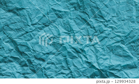 Turquoise Wrinkled Paper Background with Grunge Surface Detail Turquoise Wrinkled Paper Background with Grunge Surface Detail 129934328