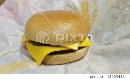 This is a double cheeseburger. 129934884