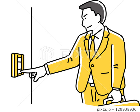 インターフォンを押す男性 129938930