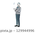 男性ー作業服を着たビジネスマンがファイルを手に持って立つ姿ー工業系ビジネスイラスト素材 129944996