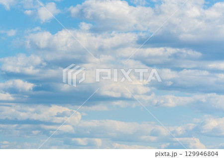 Blue sky background with white clouds. 129946804