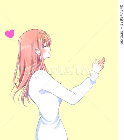 笑顔で手を伸ばす女性　冬　恋愛　横側 129947340