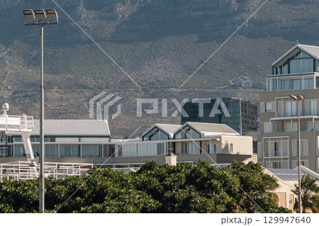 Cape Town waterfront cityscape, buildings and Table Mountain in clouds. South Africa Cape Town waterfront cityscape, buildings and Table Mountain in clouds. South Africa 129947640