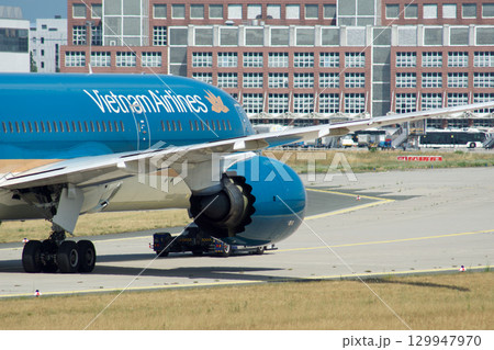 Frankfurt, Germany, July 9, 2017: Close-Up of Vietnam Airlines Boeing 787 on Taxiway Tow Frankfurt, Germany, July 9, 2017: Close-Up of Vietnam Airlines Boeing 787 on Taxiway Tow 129947970