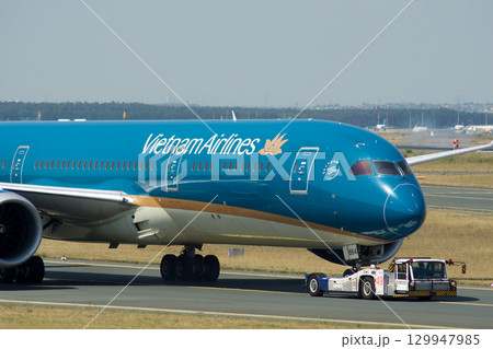 Frankfurt, Germany, July 9, 2017: Close-Up of Vietnam Airlines Boeing 787 on Taxiway Tow Frankfurt, Germany, July 9, 2017: Close-Up of Vietnam Airlines Boeing 787 on Taxiway Tow 129947985