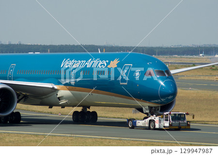 Frankfurt, Germany, July 9, 2017: Close-Up of Vietnam Airlines Boeing 787 on Taxiway Tow Frankfurt, Germany, July 9, 2017: Close-Up of Vietnam Airlines Boeing 787 on Taxiway Tow 129947987