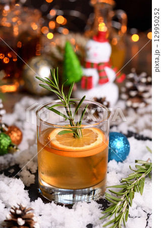 Bourbon Old Fashioned Winter Cocktail Bourbon Old Fashioned Winter Cocktail 129950252
