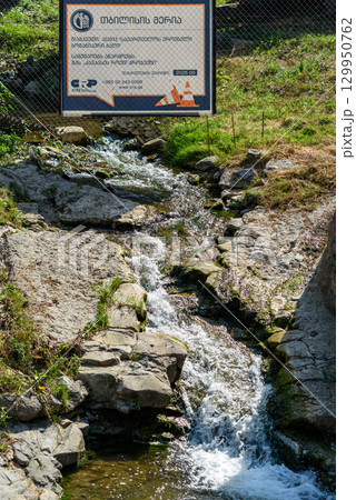 Thermal sulfuric spring in Abanotubani district in Old town of Tbilisi, Georgia 129950762