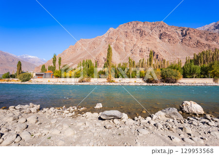 Ghunt river in Khorog city and Pamir mountains, Tajikistan Ghunt river in Khorog city and Pamir mountains, Tajikistan 129953568