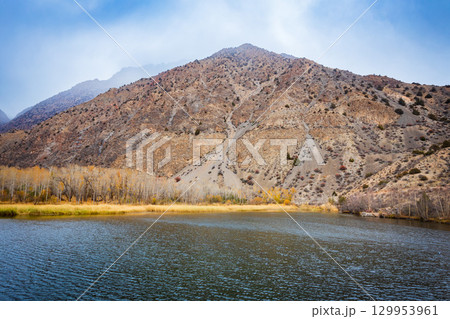 Iskanderkul mountain lake in the Fann Mountains Iskanderkul mountain lake in the Fann Mountains 129953961