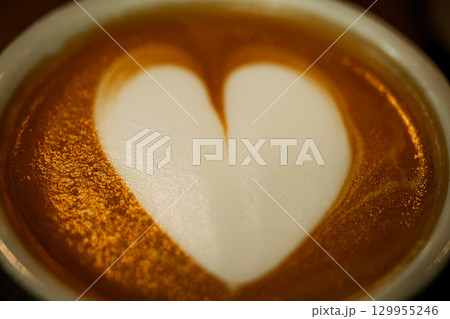 Cups of coffee decorated with a heart Cups of coffee decorated with a heart 129955246