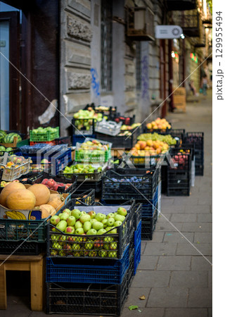 Vibrant street market with various fruits and vegetables displayed in crates, in Tbilisi, Georgia 129955494