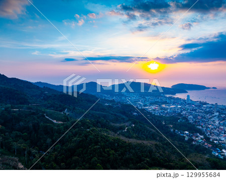 Aerial view of beautiful sunset sky over mountains with sea at Patong bay Phuket city Thailand 129955684