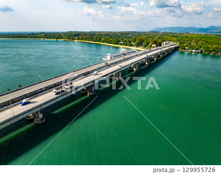Aerial view of Sarasin bridge road transportation background concept The bridge is a between Phang Nga and Phuket island Thailand The bridge is the most important in making business and transportation Aerial view of Sarasin bridge road transportation background concept The bridge is a between Phang Nga and Phuket island Thailand The bridge is the most important in making business and transportation 129955726