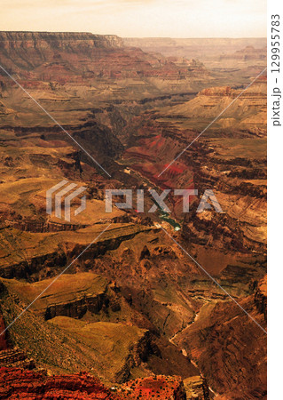 Sunset Hazy Sky Day At The Grand Canyon Arizona 129955783