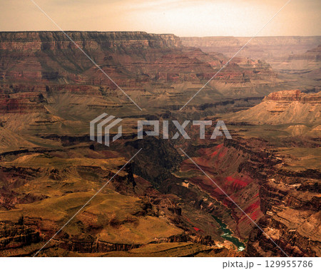 Sunset Hazy Sky Day At The Grand Canyon Arizona 129955786