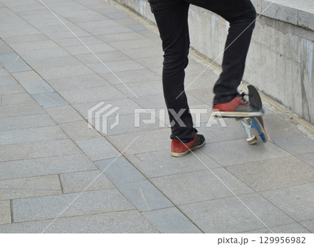 skateboard, a man riding and making stunts skateboard, a man riding and making stunts 129956982