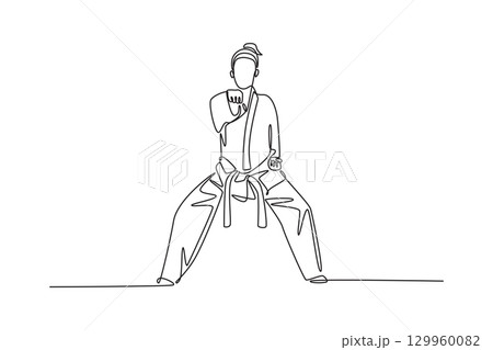Single continuous line drawing female karate athlete in strong low stance. Symbolizing power, discipline, and the self-defense aspect of martial arts. One line draw graphic design vector illustration 129960082