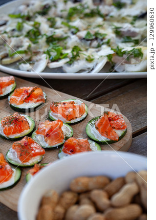 Apperitif time on a buffet 129960630