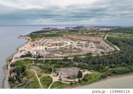 Aerial drone view of Novigrad coast and quarry. Istria, Croatia. 129966118