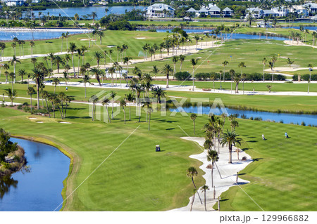 Golf course on ocean shore in southwest Florida. Seaside golfing field in Boca Grande Golf course on ocean shore in southwest Florida. Seaside golfing field in Boca Grande 129966882