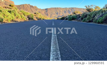 The Scenic Mountain Road at Sunrise offers a truly tranquil and breathtaking landscape for all The Scenic Mountain Road at Sunrise offers a truly tranquil and breathtaking landscape for all 129968591