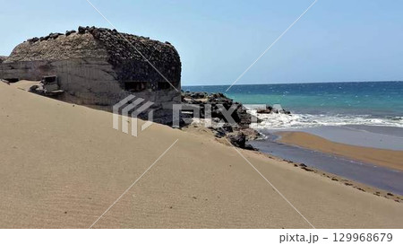 A Historical Coastal Fortress Standing Strong by the Gorgeous Ocean and Its Waves 129968679